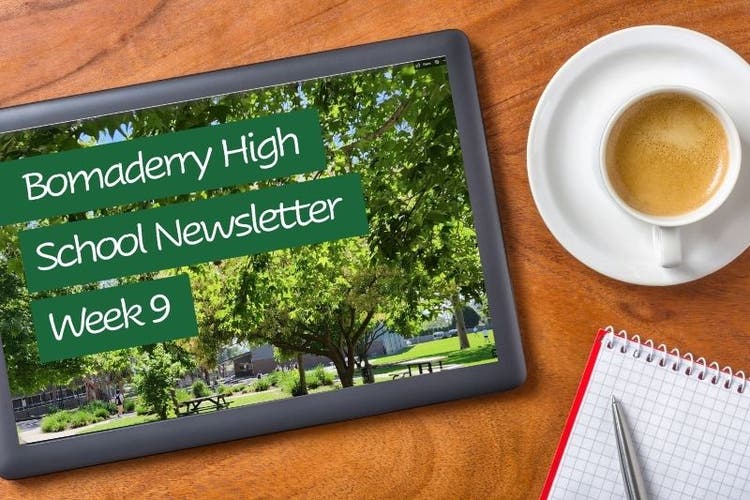 image of ipad with school newsletter on it and cup of tea to side